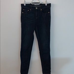 Dark wash low rise super skinny denim
